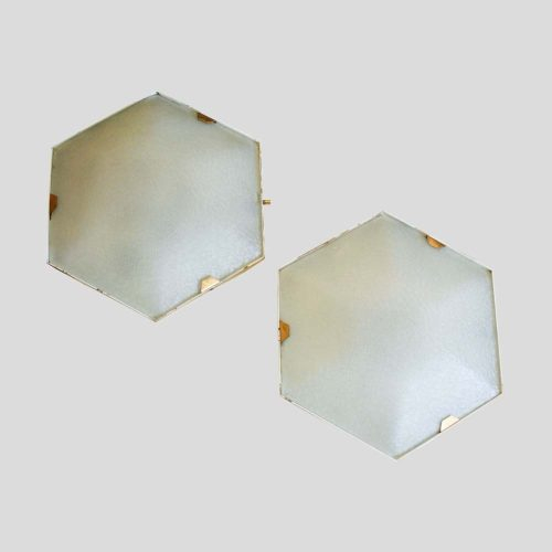 Pair of hexagonal shaped sconces by Stilnovo model 1183
