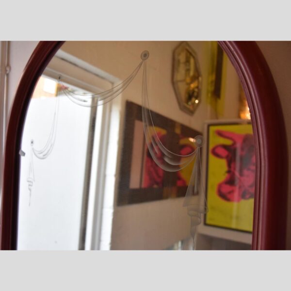1940's red lacquered arc mirror