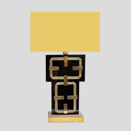 A black perspex with brass deco table lamps by Frigerio