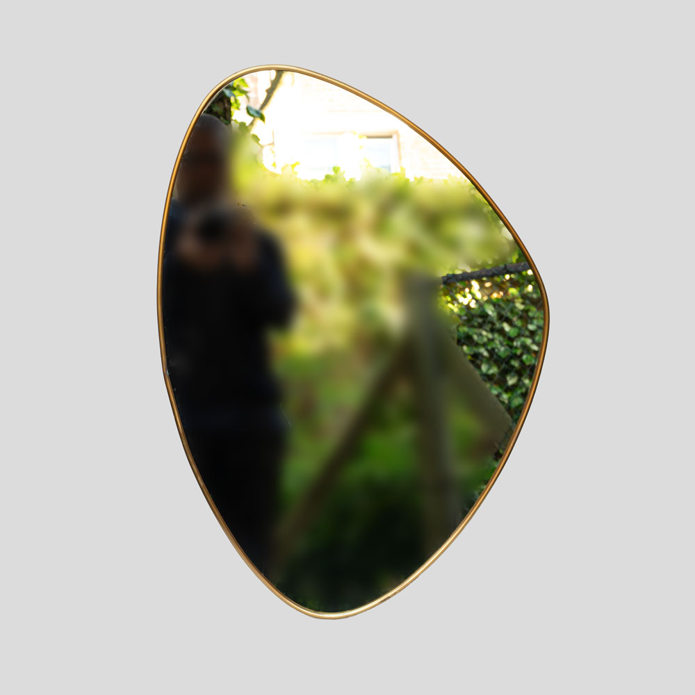 Set of 2  Italian design brass frame asymmetrical mirrors