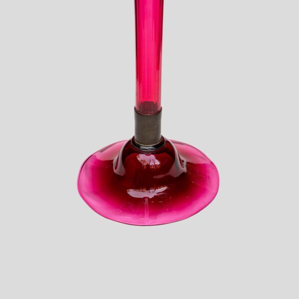 A Tall ruby color blown glass flared single trumpet shape