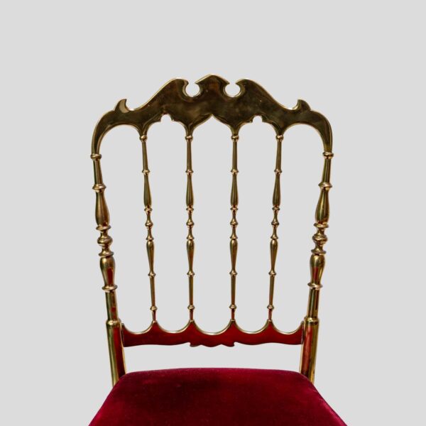 Red velvet upholstered brass metal chairs by Chiavari