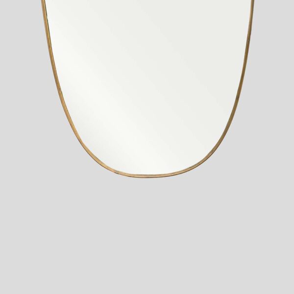 Large vintage Italian design shield shaped brass mirror