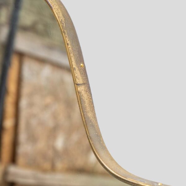 Large vintage Italian design shield shaped brass mirror