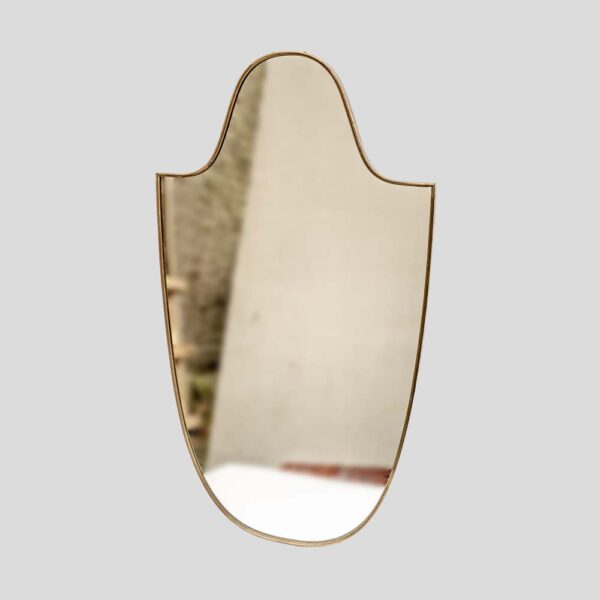 Large vintage Italian design shield shaped brass mirror