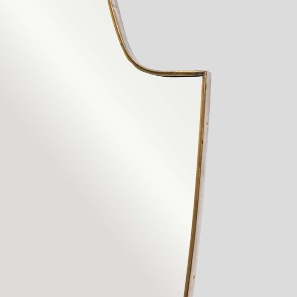 Large vintage Italian design shield shaped brass mirror